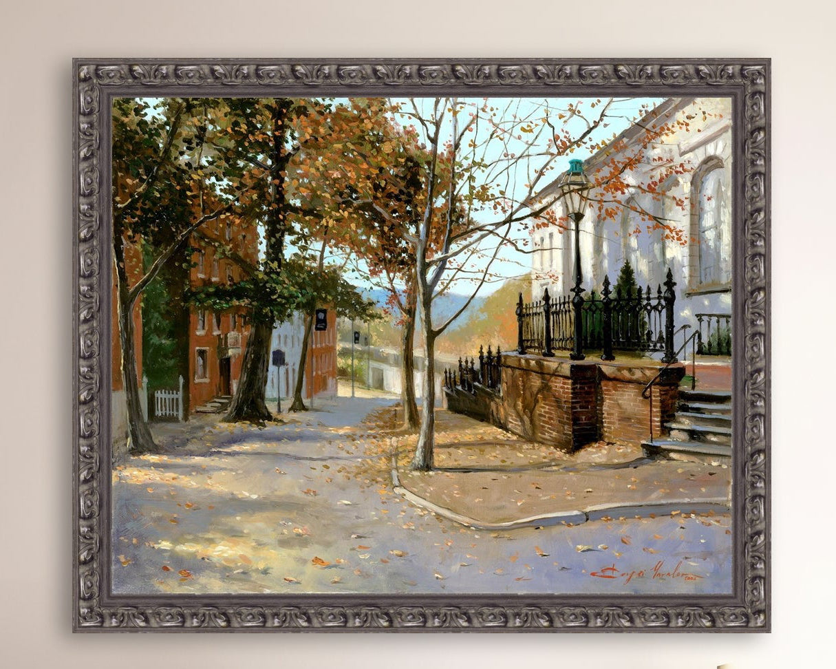 A canvas print featuring a vibrant street scene with trees and a building, titled 'Autumn Leaves on Church Street', Bethlehem 