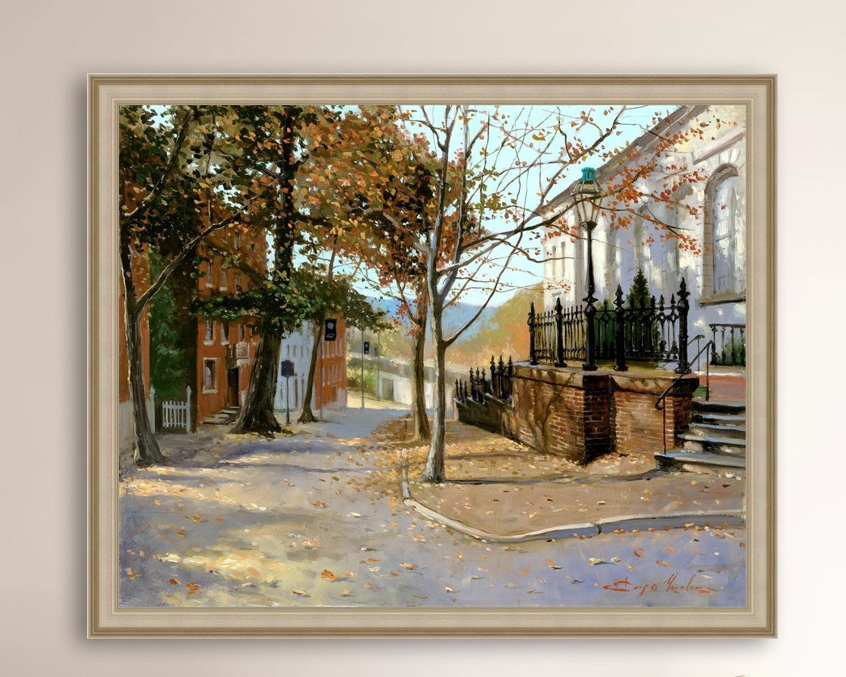 A canvas print featuring a vibrant street scene with trees and a building, titled 'Autumn Leaves on Church Street', Bethlehem 