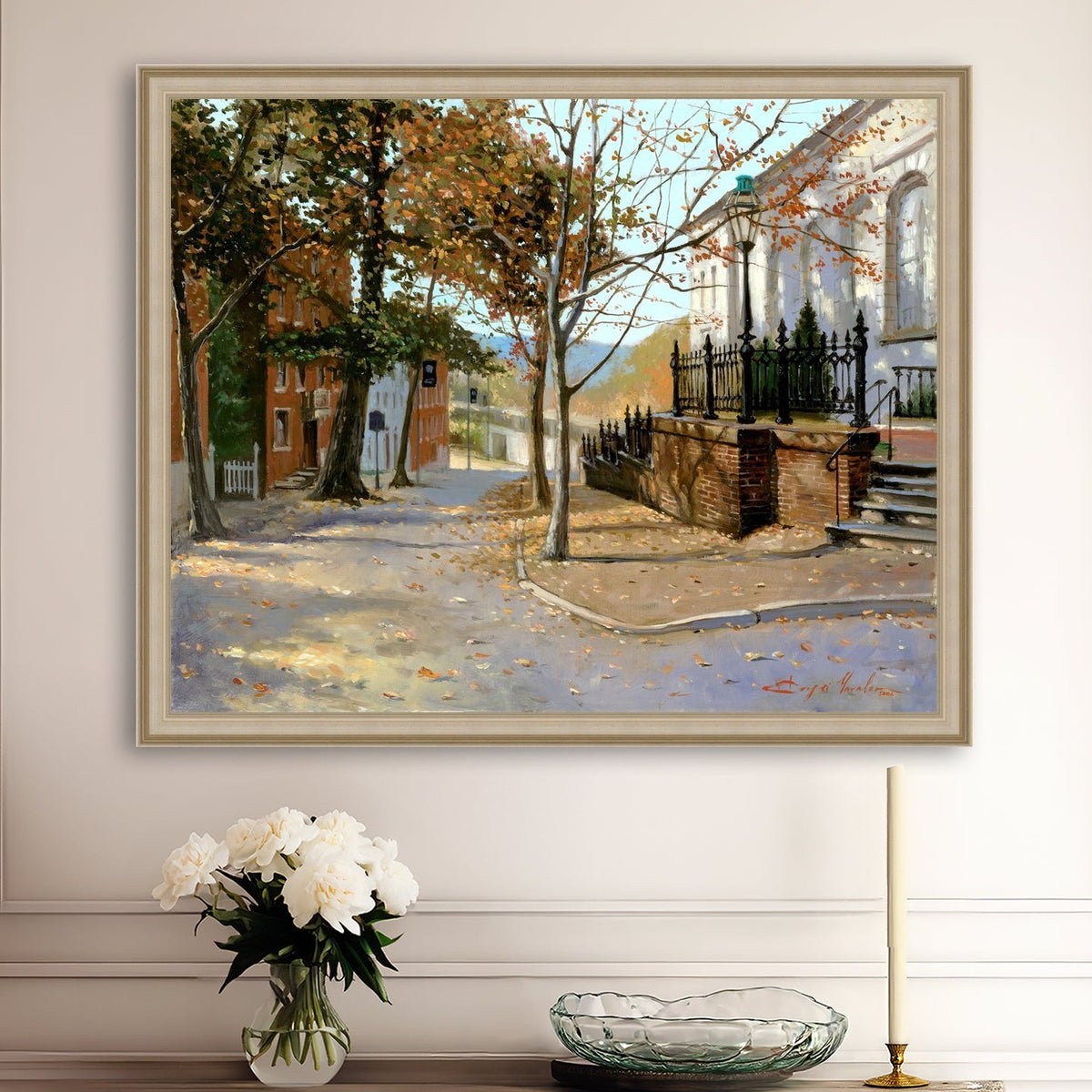 A canvas print featuring a vibrant street scene with trees and a building, titled 'Autumn Leaves on Church Street', Bethlehem 