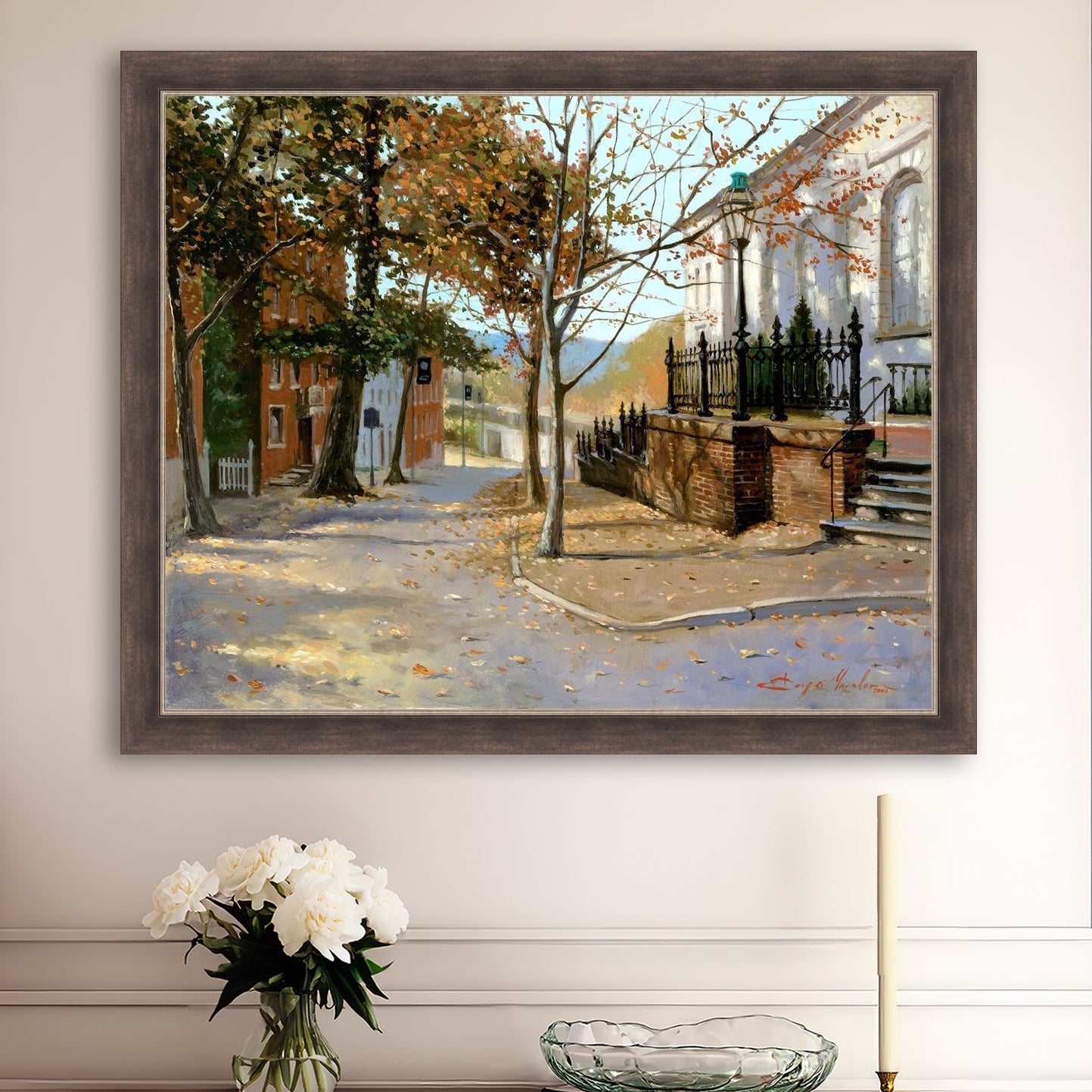 A canvas print featuring a vibrant street scene with trees and a building, titled 'Autumn Leaves on Church Street', Bethlehem 