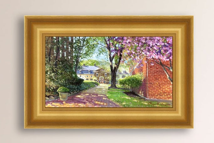 A canvas print depicting a vibrant spring scene with a pathway, trees in bloom, and a historic Moravian Chapel in the background.