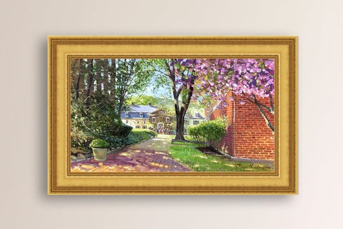 A canvas print depicting a vibrant spring scene with a pathway, trees in bloom, and a historic Moravian Chapel in the background.
