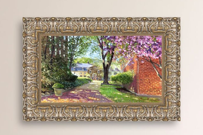 A canvas print depicting a vibrant spring scene with a pathway, trees in bloom, and a historic Moravian Chapel in the background.