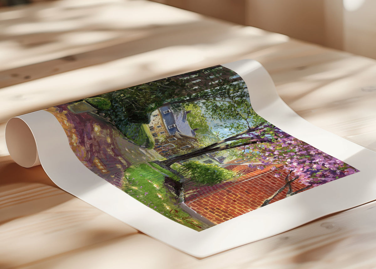 A canvas print depicting a vibrant spring scene with a pathway, trees in bloom, and a historic Moravian Chapel in the background.