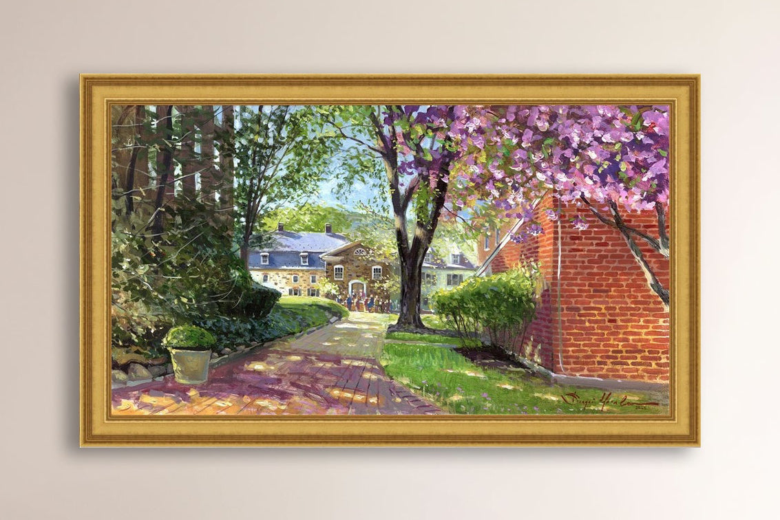 A canvas print depicting a vibrant spring scene with a pathway, trees in bloom, and a historic Moravian Chapel in the background.