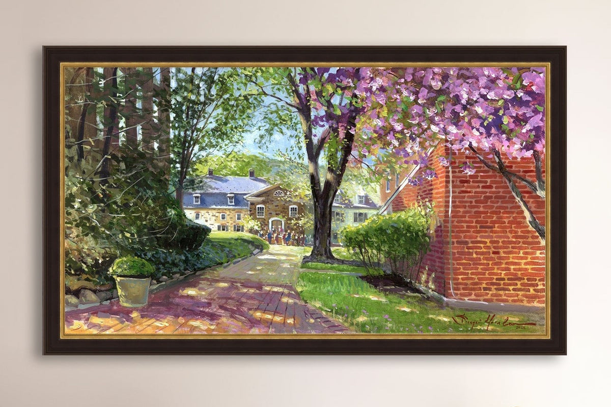 A canvas print depicting a vibrant spring scene with a pathway, trees in bloom, and a historic Moravian Chapel in the background.