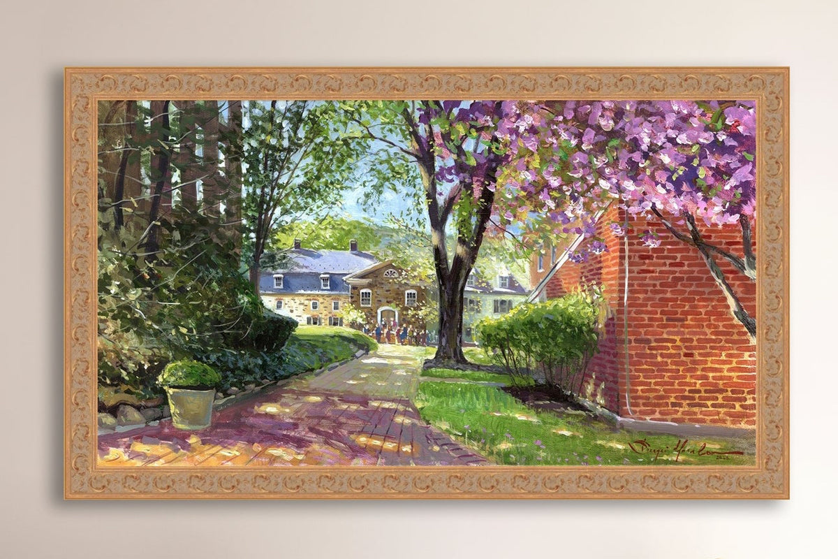 A canvas print depicting a vibrant spring scene with a pathway, trees in bloom, and a historic Moravian Chapel in the background.