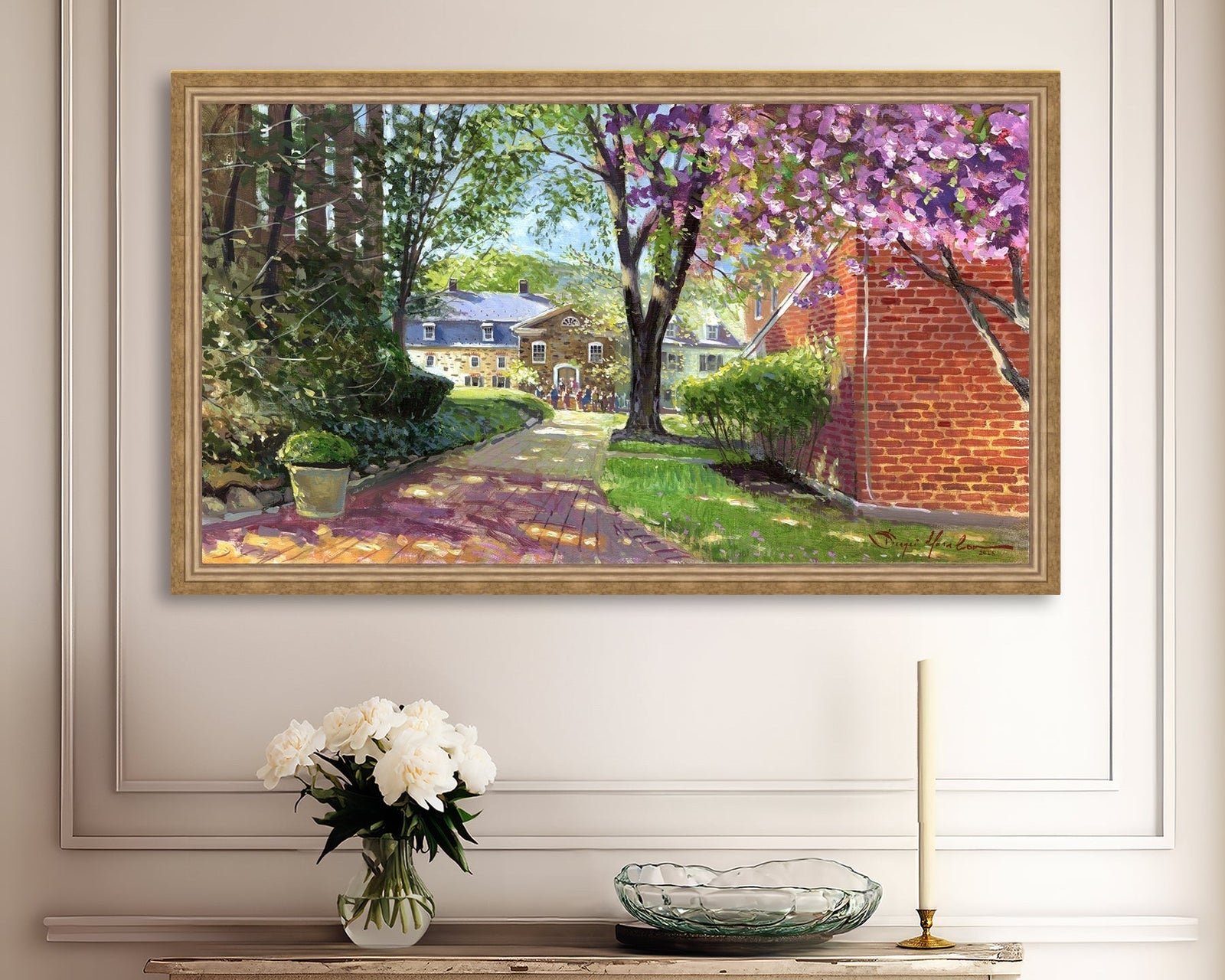 A canvas print depicting a vibrant spring scene with a pathway, trees in bloom, and a historic Moravian Chapel in the background.
