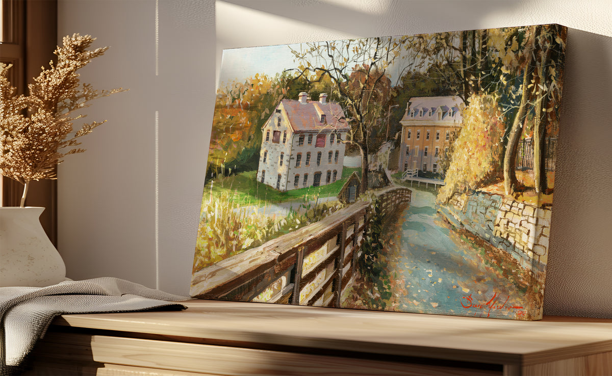 A canvas print depicting the Colonial Industrial Quarter in Bethlehem, PA, showing an artistic representation of an old industrial building complex with trees and a canal.