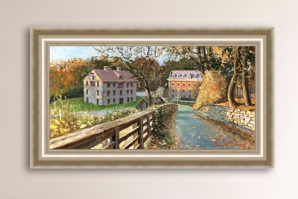 A canvas print depicting the Colonial Industrial Quarter in Bethlehem, PA, showing an artistic representation of an old industrial building complex with trees and a canal.