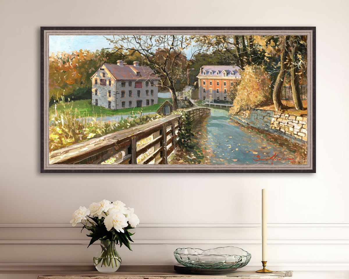 A canvas print depicting the Colonial Industrial Quarter in Bethlehem, PA, showing an artistic representation of an old industrial building complex with trees and a canal.