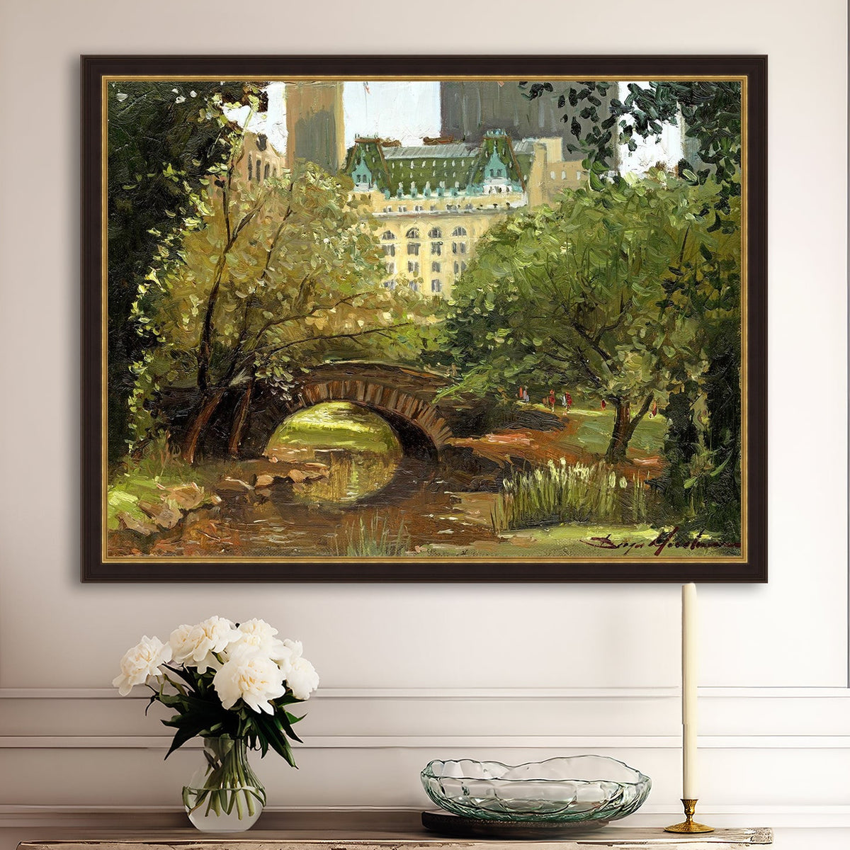A canvas print of 'Summer in Central Park, New York' featuring bridge in the park and Plaza Hotel in the background.