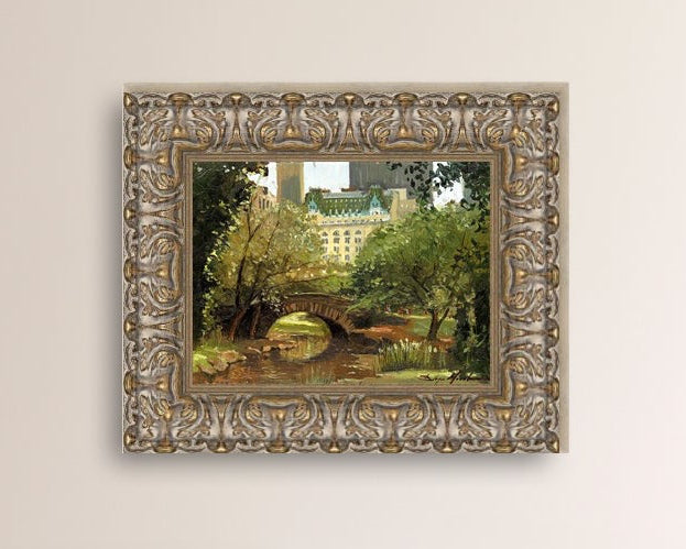 A canvas print of 'Summer in Central Park, New York' featuring bridge in the park and Plaza Hotel in the background.