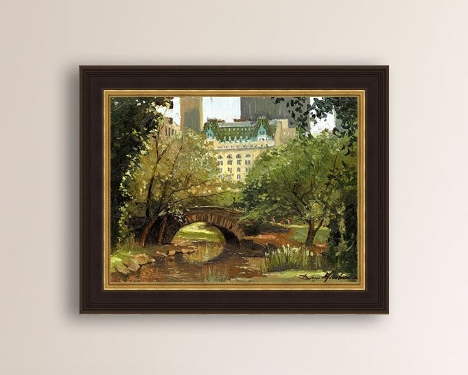 A canvas print of 'Summer in Central Park, New York' featuring bridge in the park and Plaza Hotel in the background.