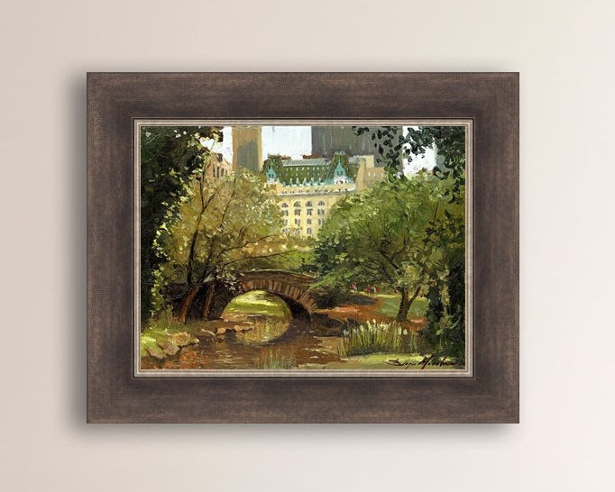 A canvas print of 'Summer in Central Park, New York' featuring bridge in the park and Plaza Hotel in the background.