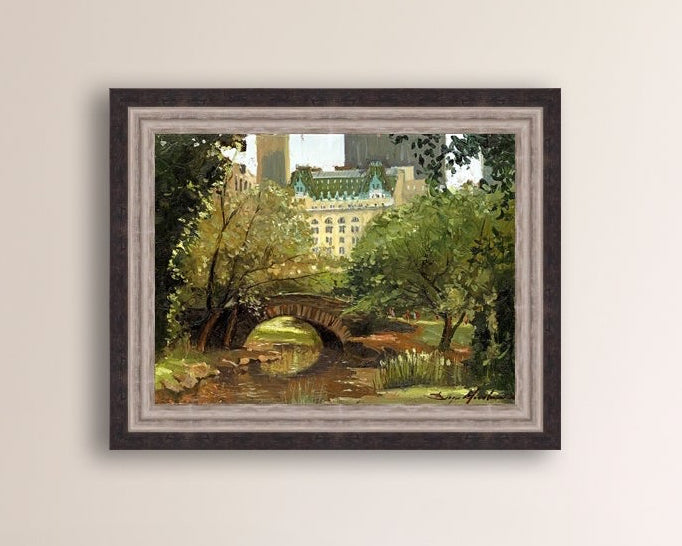 A canvas print of 'Summer in Central Park, New York' featuring bridge in the park and Plaza Hotel in the background.
