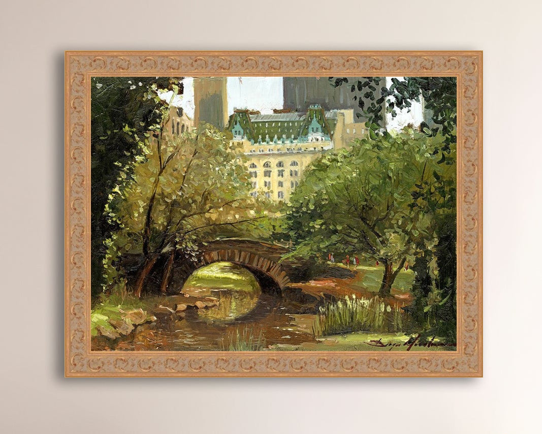 A canvas print of 'Summer in Central Park, New York' featuring bridge in the park and Plaza Hotel in the background.