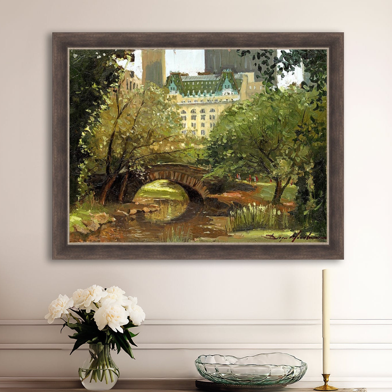 A canvas print of 'Summer in Central Park, New York' featuring bridge in the park and Plaza Hotel in the background.