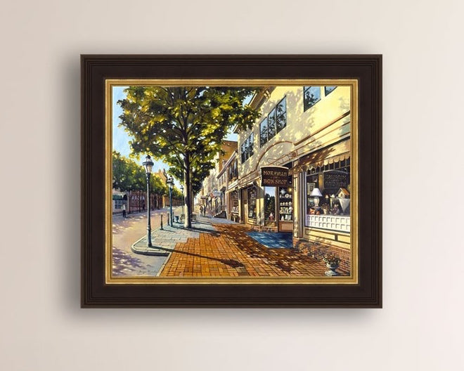 A vibrant giclee canvas print depicting a main street Bethlehem scene with Moravian Book shop.