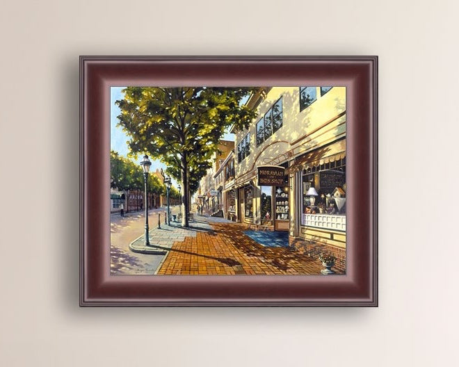 A vibrant giclee canvas print depicting a main street Bethlehem scene with Moravian Book shop.