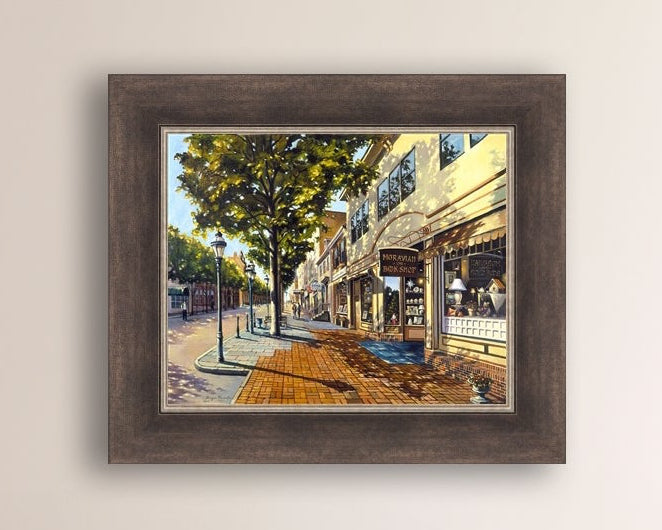 A vibrant giclee canvas print depicting a main street Bethlehem scene with Moravian Book shop.