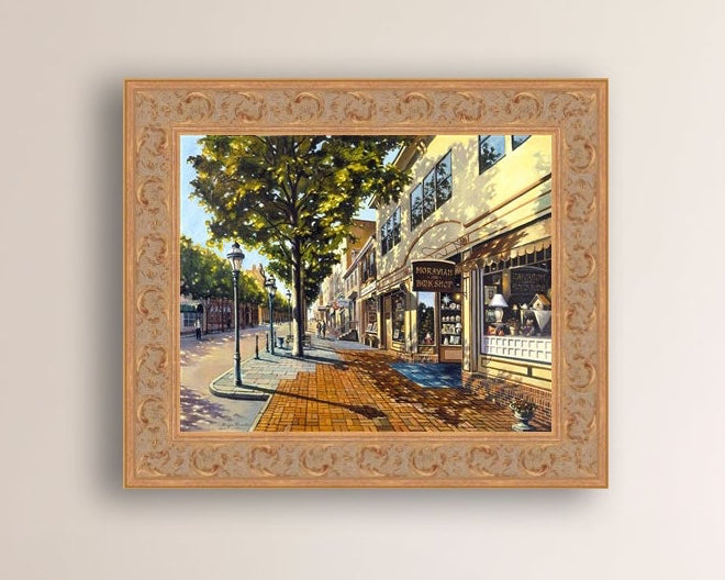 A vibrant giclee canvas print depicting a main street Bethlehem scene with Moravian Book shop.