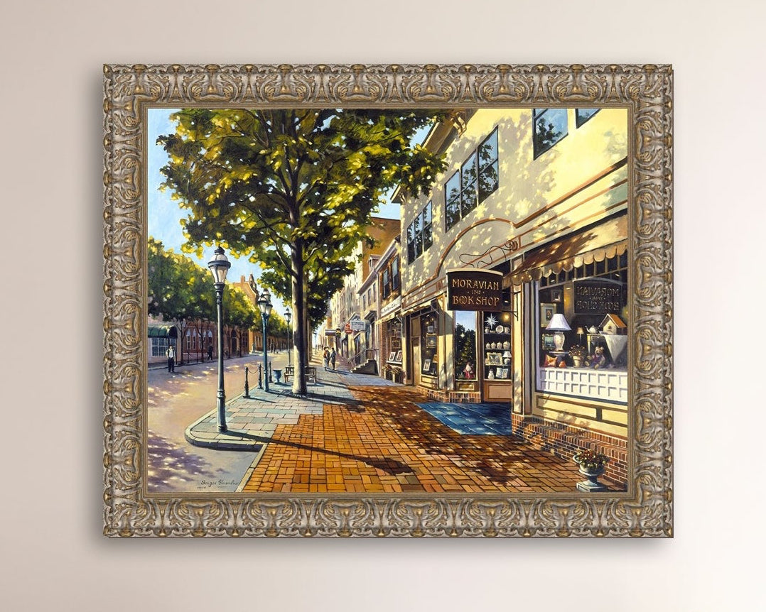 A vibrant giclee canvas print depicting a main street Bethlehem scene with Moravian Book shop.