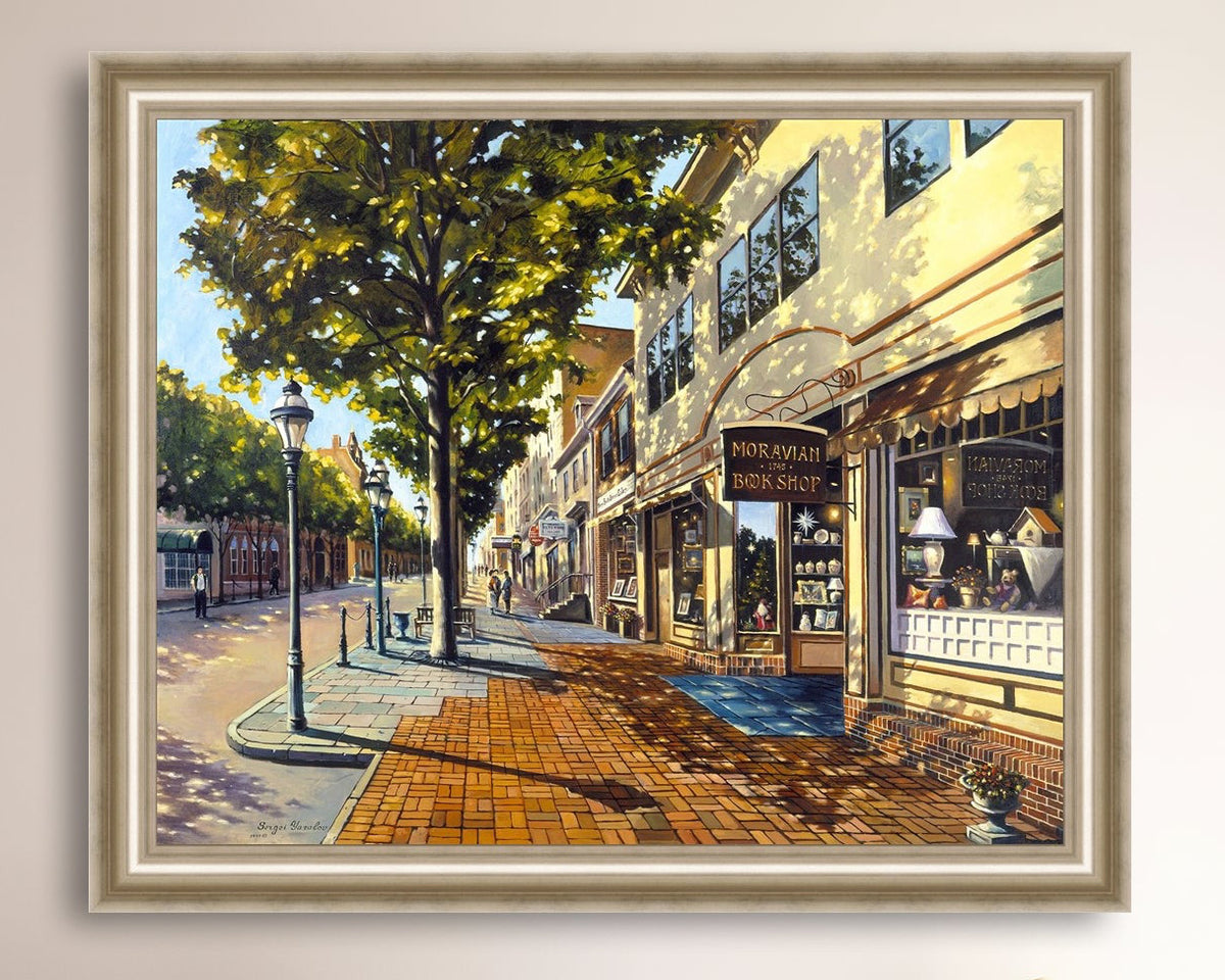 A vibrant giclee canvas print depicting a main street Bethlehem scene with Moravian Book shop.