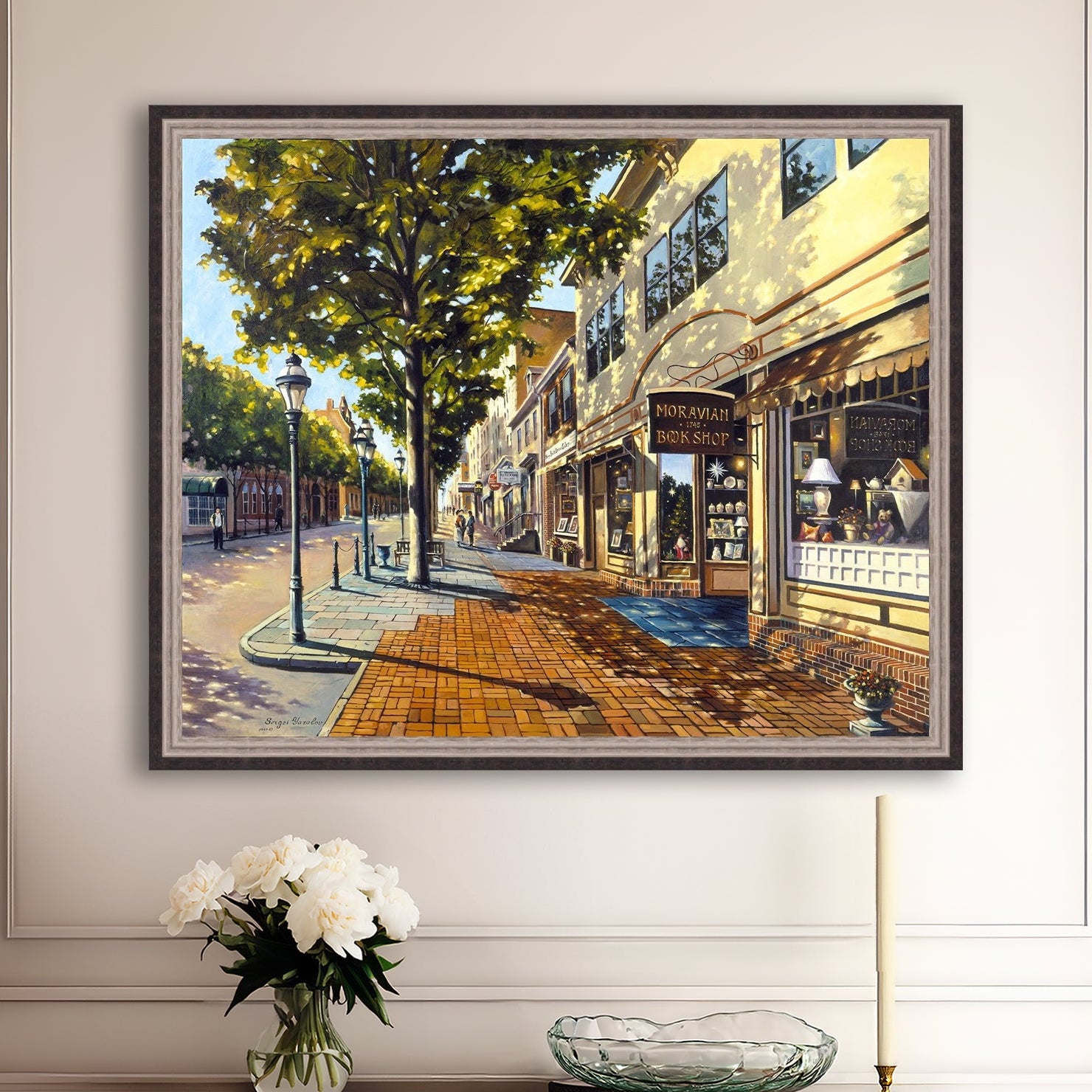 A vibrant giclee canvas print depicting a main street Bethlehem scene with Moravian Book shop.