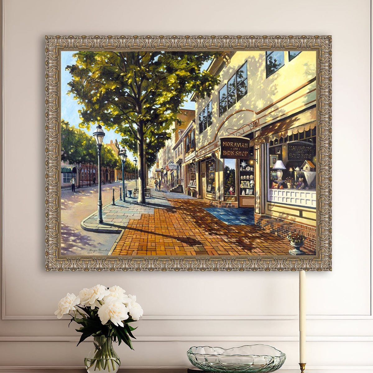 A vibrant giclee canvas print depicting a main street Bethlehem scene with Moravian Book shop.