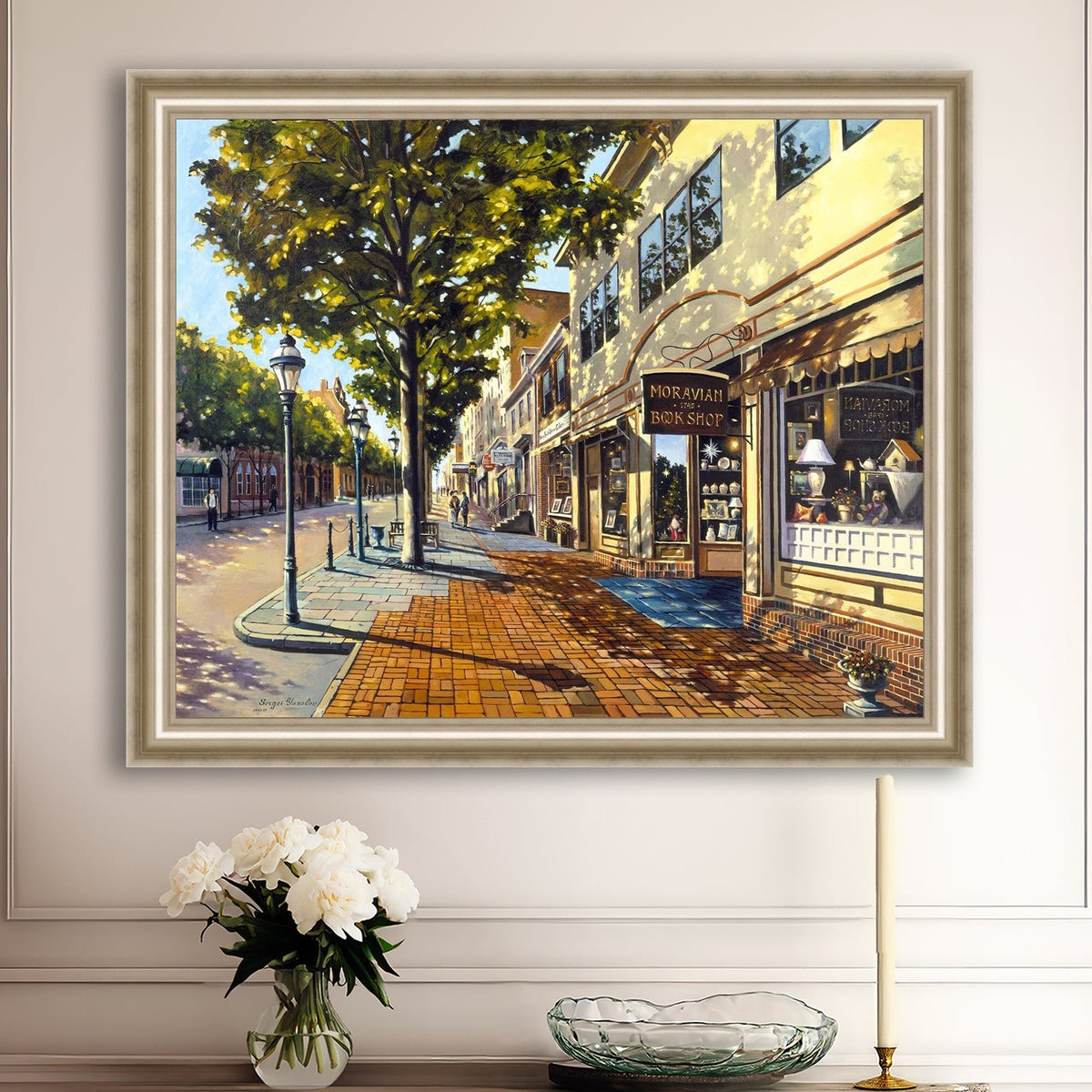 A vibrant giclee canvas print depicting a main street Bethlehem scene with Moravian Book shop.