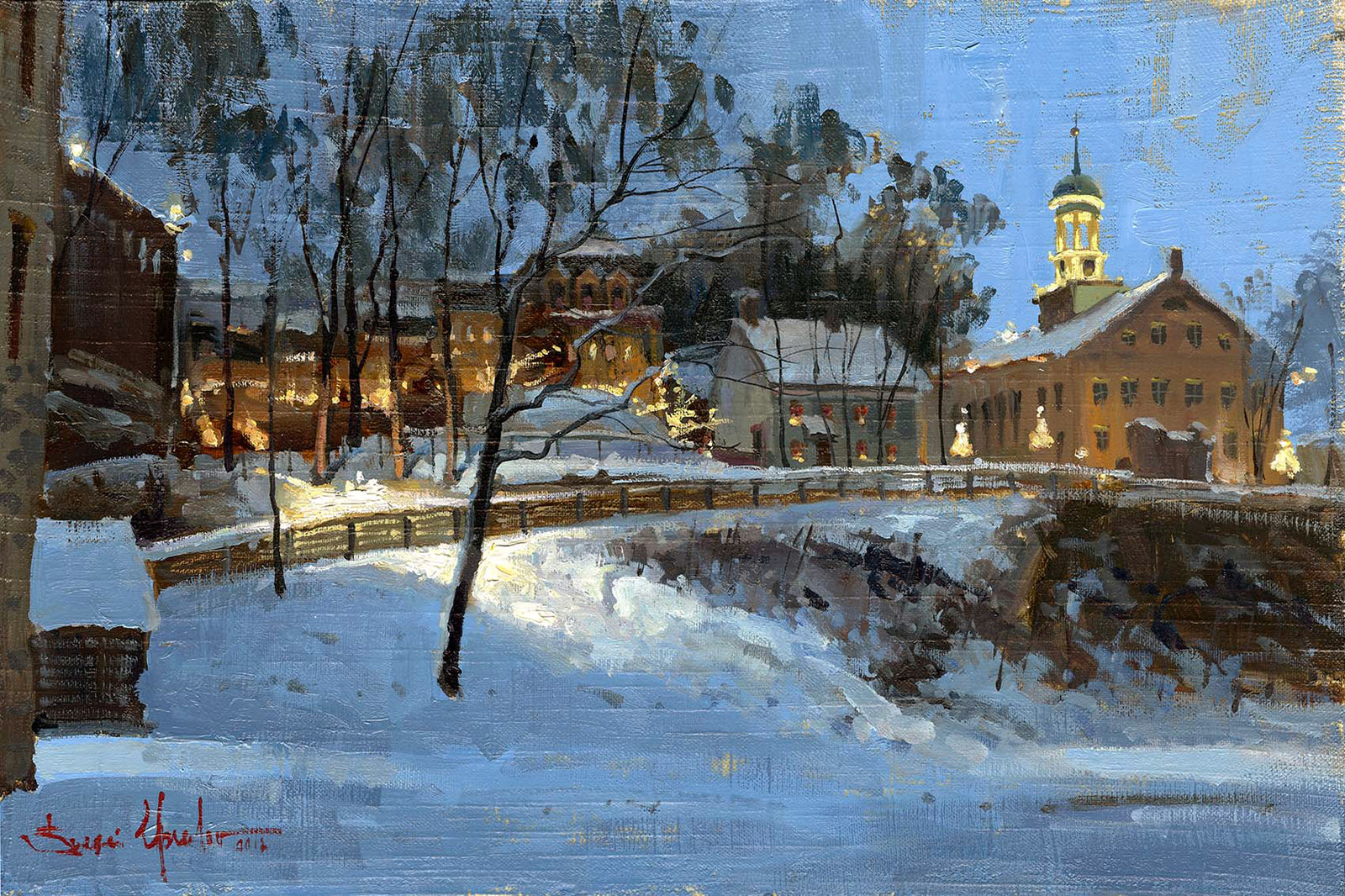Winter scene with Moravian Church and Main Street, illuminated by lights.