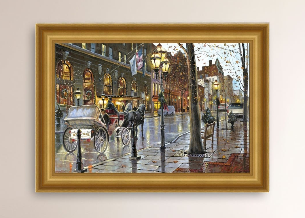 A canvas print depicting a Christmas scene with a horse-drawn carriage on a wet main street in Bethlehem with stores and Christmas lights in the background.