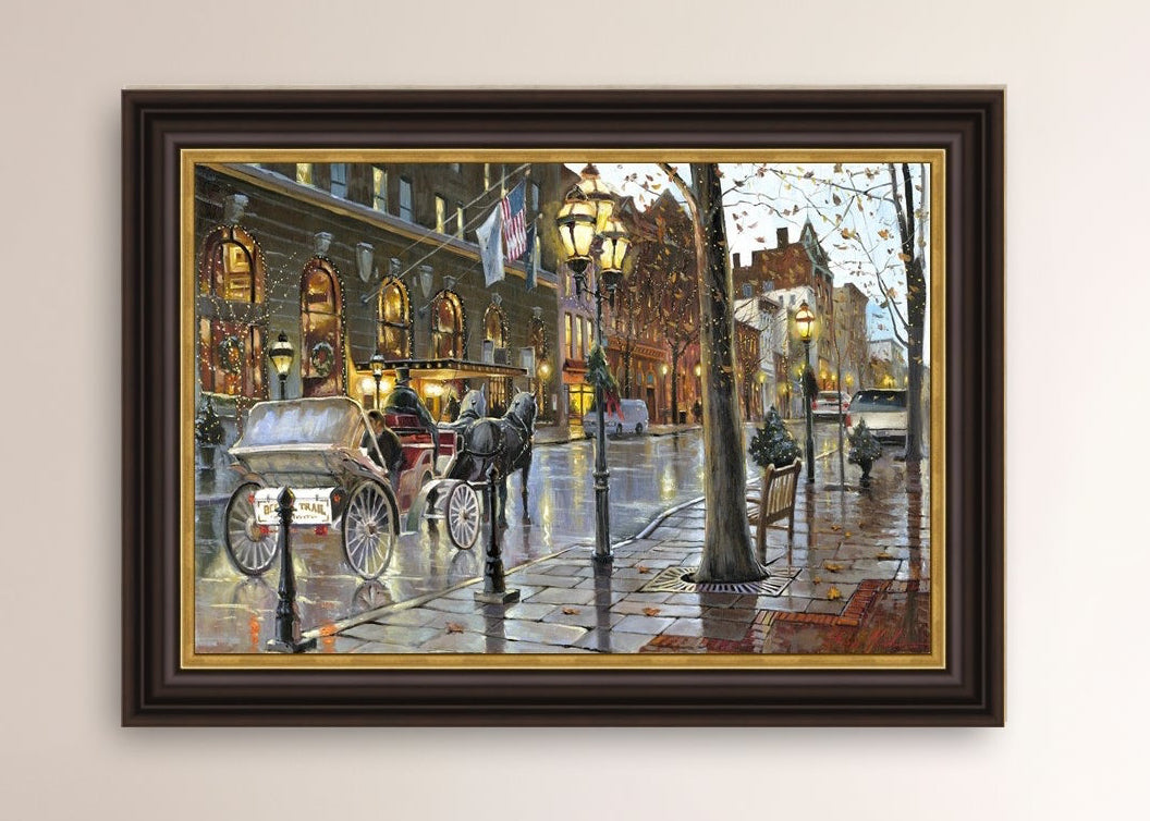 A canvas print depicting a Christmas scene with a horse-drawn carriage on a wet main street in Bethlehem with stores and Christmas lights in the background.