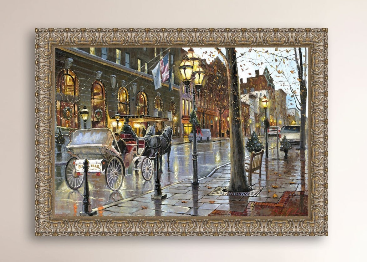 A canvas print depicting a Christmas scene with a horse-drawn carriage on a wet main street in Bethlehem with stores and Christmas lights in the background.
