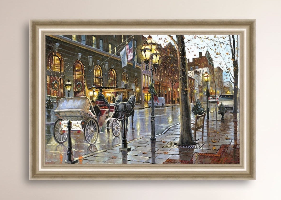 A canvas print depicting a Christmas scene with a horse-drawn carriage on a wet main street in Bethlehem with stores and Christmas lights in the background.