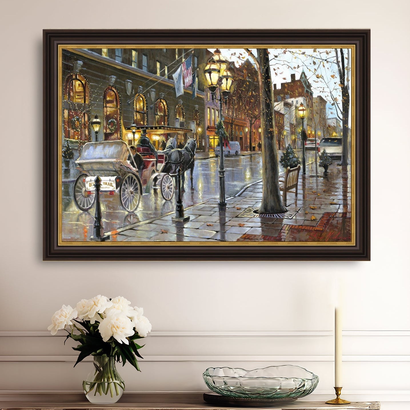 A canvas print depicting a Christmas scene with a horse-drawn carriage on a wet main street in Bethlehem with stores and Christmas lights in the background.