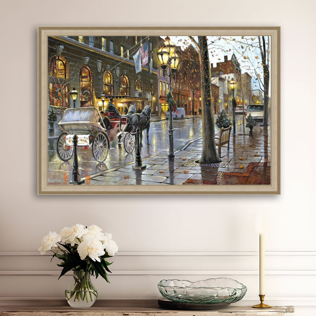 A canvas print depicting a Christmas scene with a horse-drawn carriage on a wet main street in Bethlehem with stores and Christmas lights in the background.