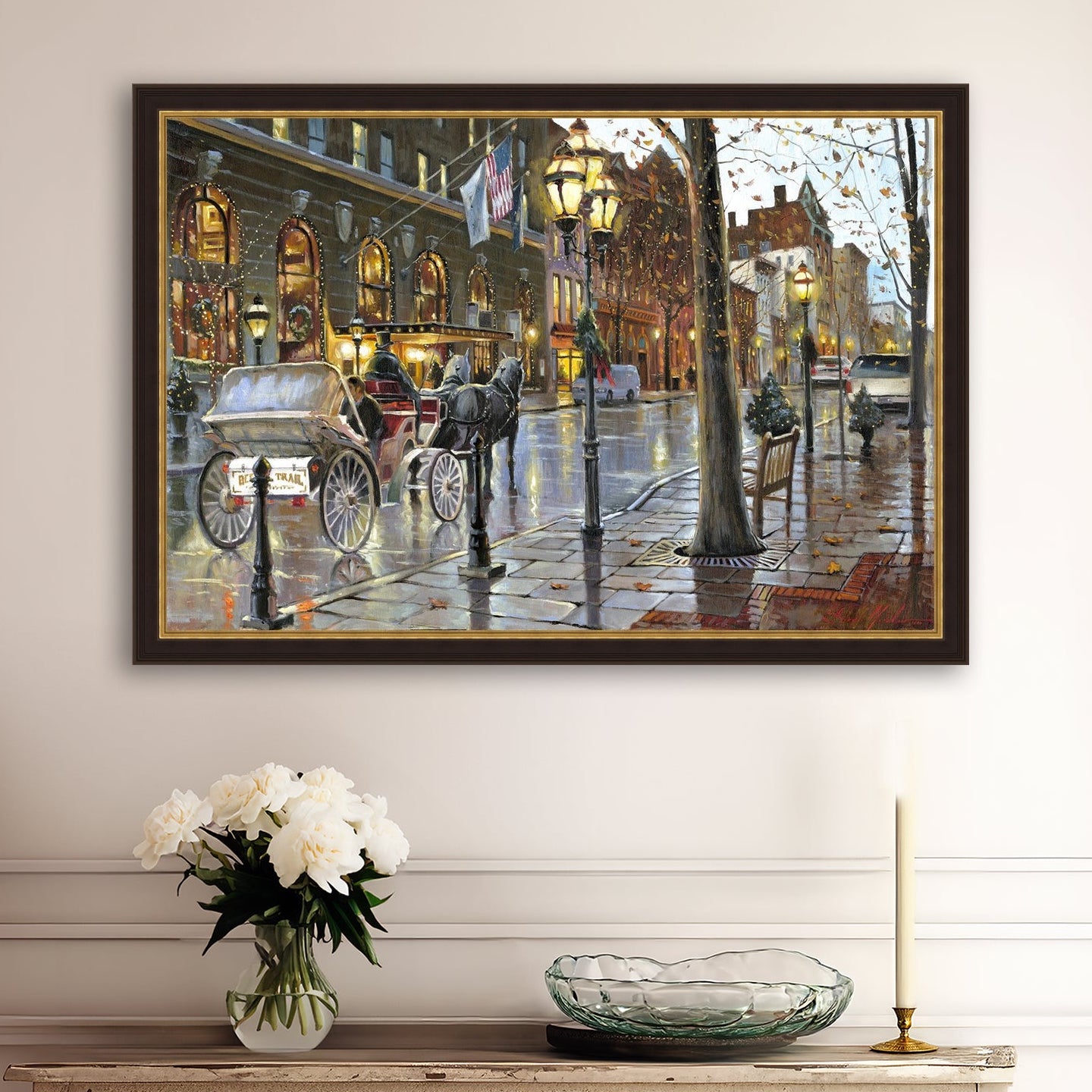 A canvas print depicting a Christmas scene with a horse-drawn carriage on a wet main street in Bethlehem with stores and Christmas lights in the background.