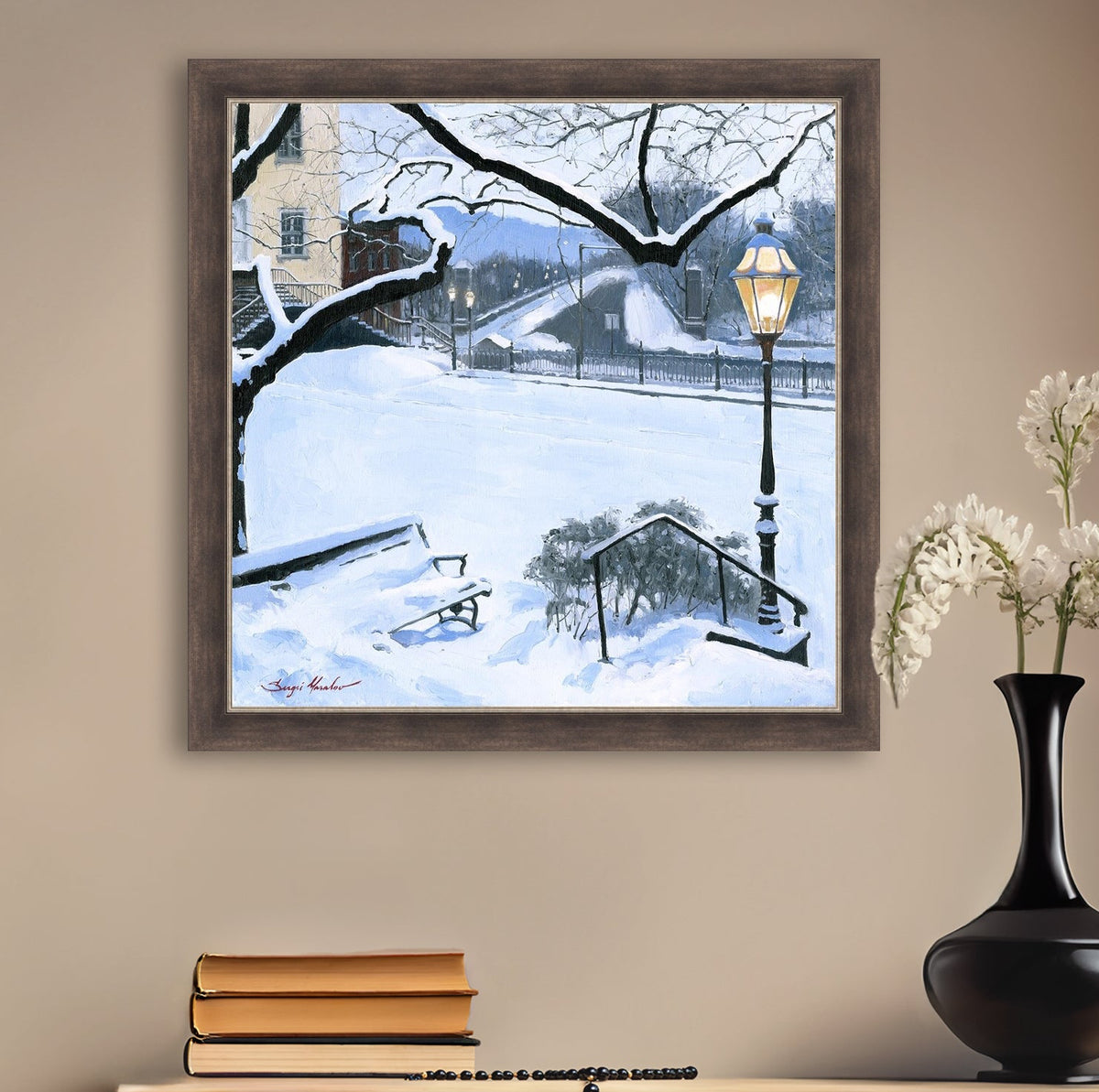 A canvas print featuring a snowy landscape with a bench, a lamp post, in the foreground, and Moravian Church in the background.
