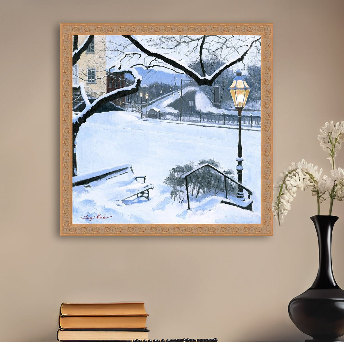 A canvas print featuring a snowy landscape with a bench, a lamp post, in the foreground, and Moravian Church in the background.