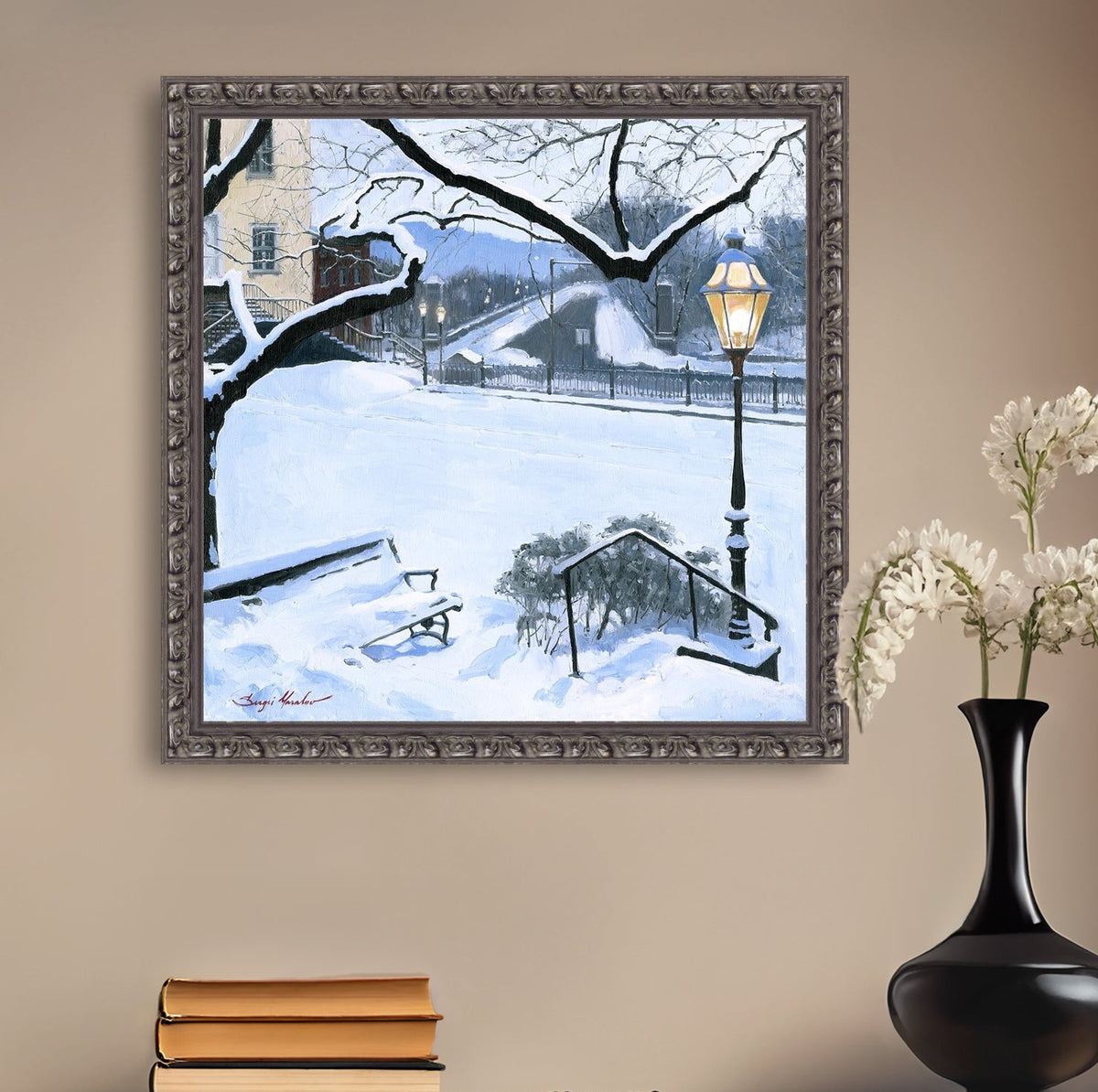 A canvas print featuring a snowy landscape with a bench, a lamp post, in the foreground, and Moravian Church in the background.