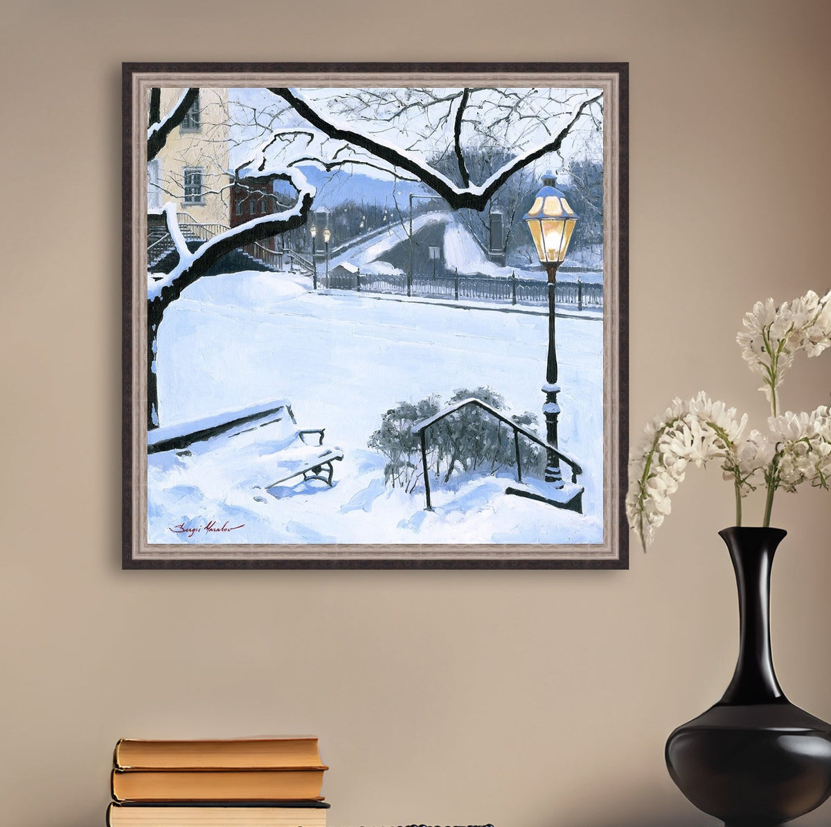 A canvas print featuring a snowy landscape with a bench, a lamp post, in the foreground, and Moravian Church in the background.