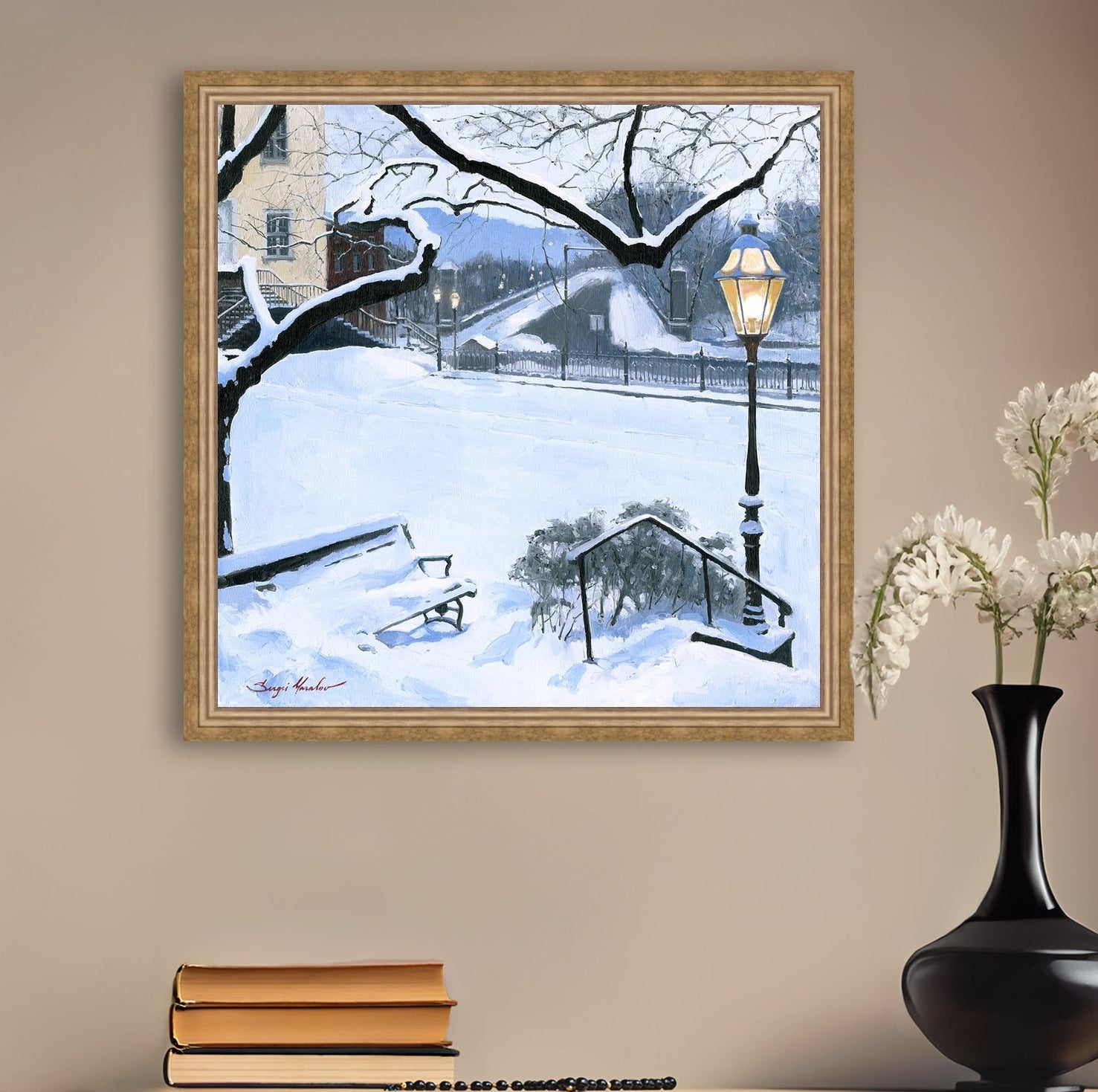 A canvas print featuring a snowy landscape with a bench, a lamp post, in the foreground, and Moravian Church in the background.