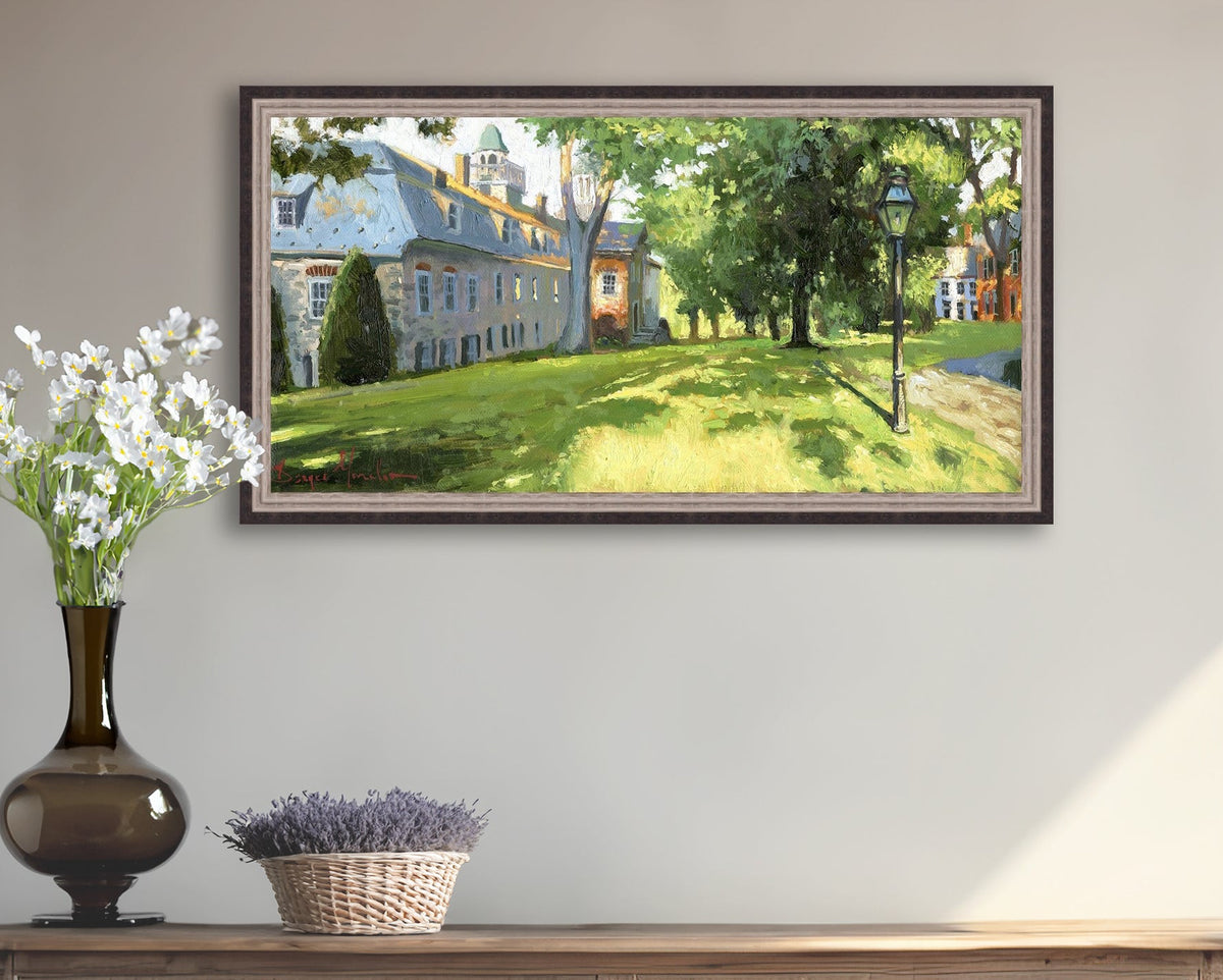 Painting of a sunlit Moravian Chapel with a lamp post and trees.