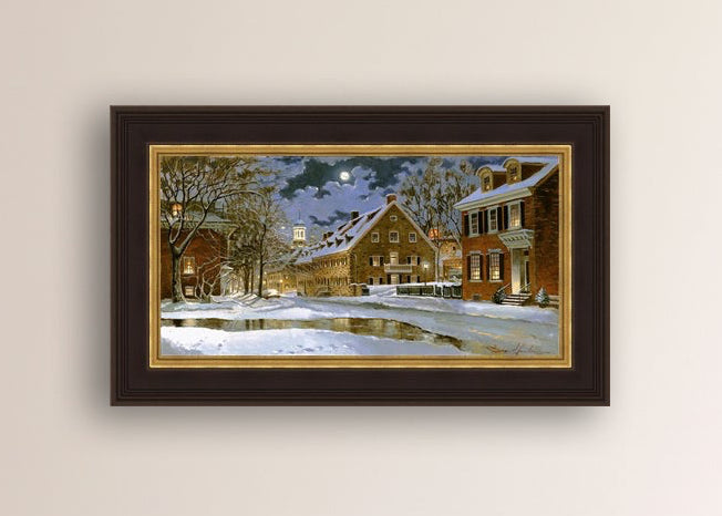 Snowy Bethlehem scene with Moravian Church at night.