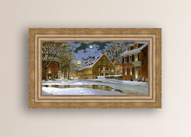 Snowy Bethlehem scene with Moravian Church at night.