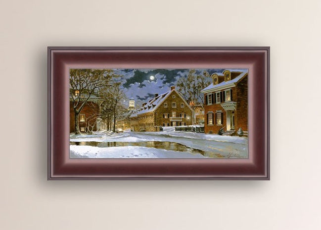 Snowy Bethlehem scene with Moravian Church at night.
