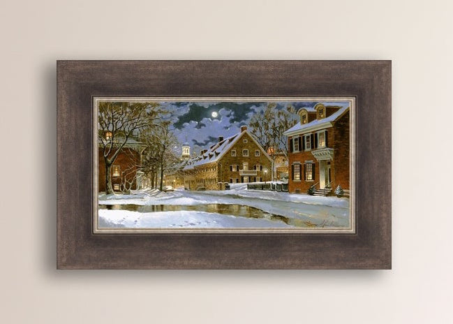 Snowy Bethlehem scene with Moravian Church at night.