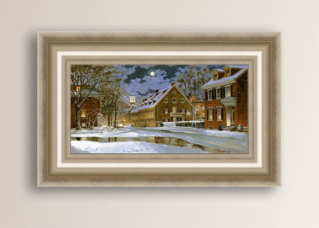 Snowy Bethlehem scene with Moravian Church at night.